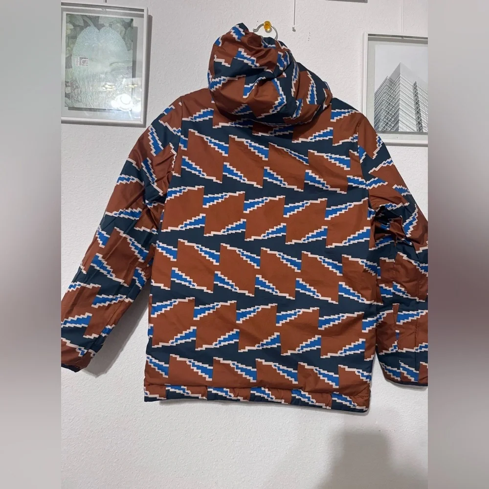 Patagonia Blue and Brown Puffer Jacket with Geometric Design